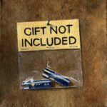 Humour and illusion series ”Gift not included”